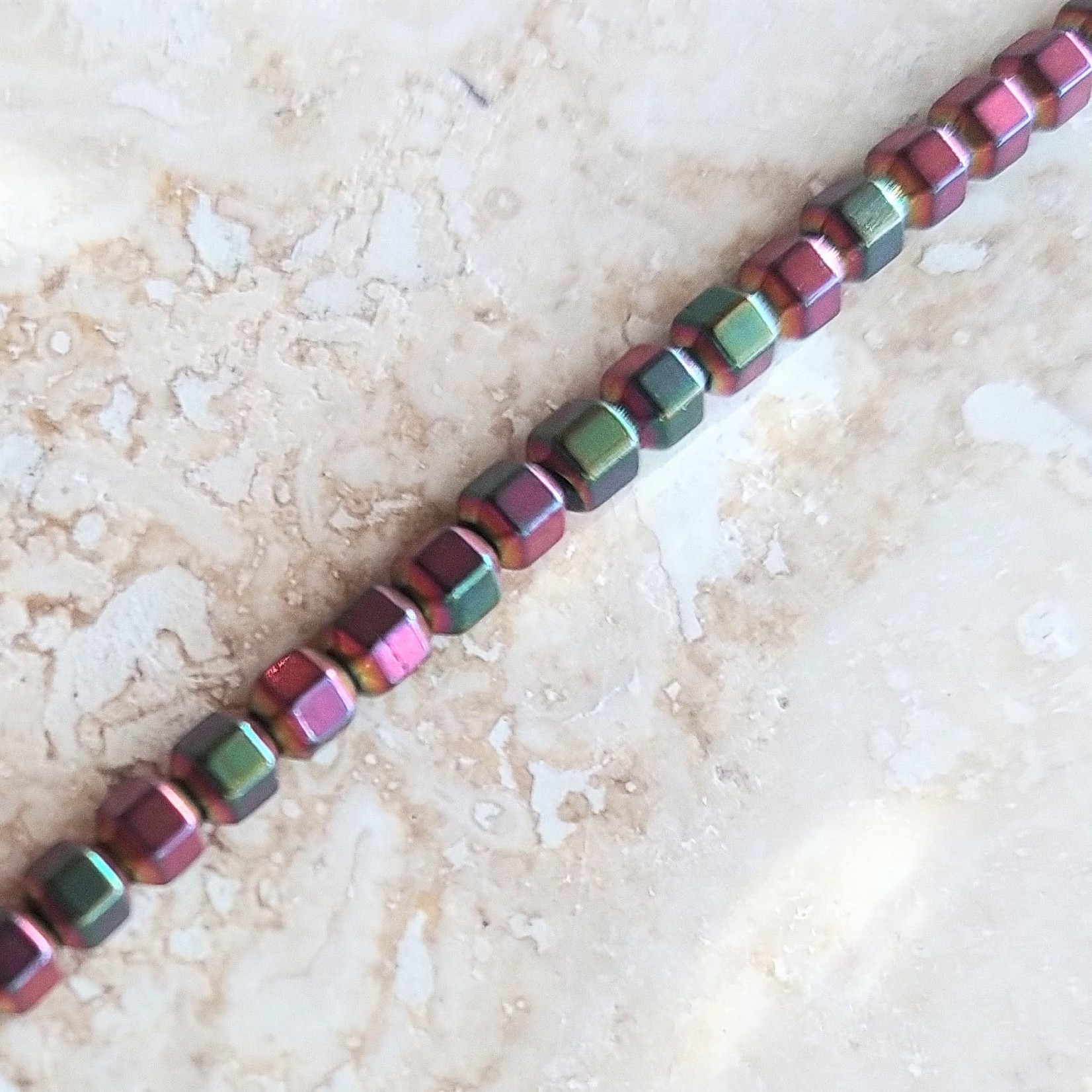 Hematite  3mm Rainbow Hexagon Bead Strand