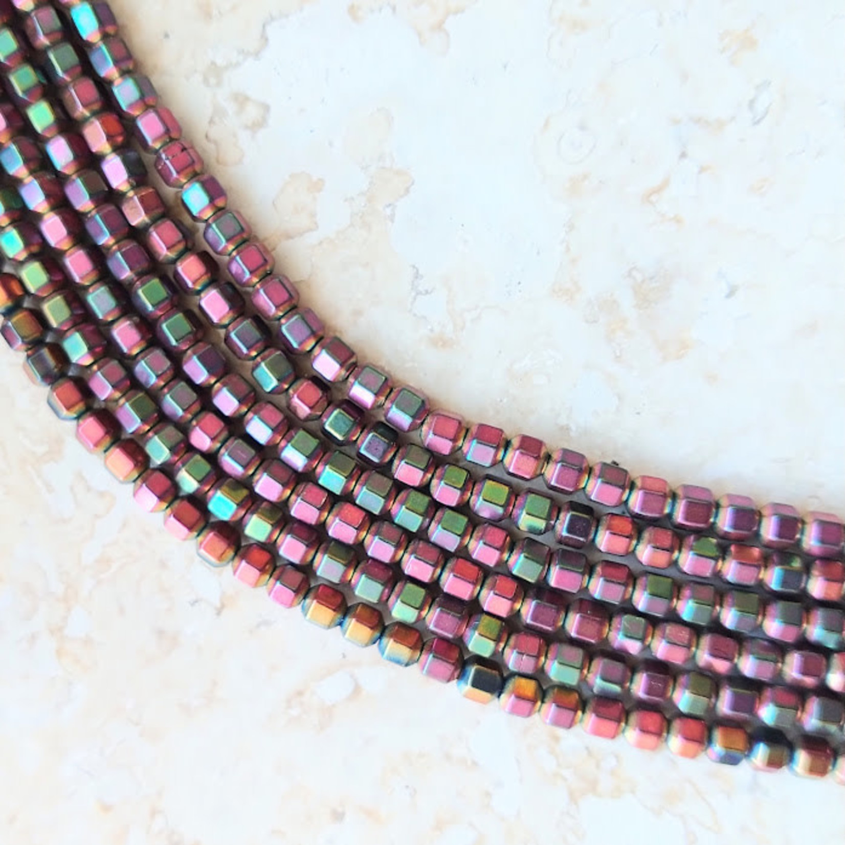 Hematite  3mm Rainbow Hexagon Bead Strand