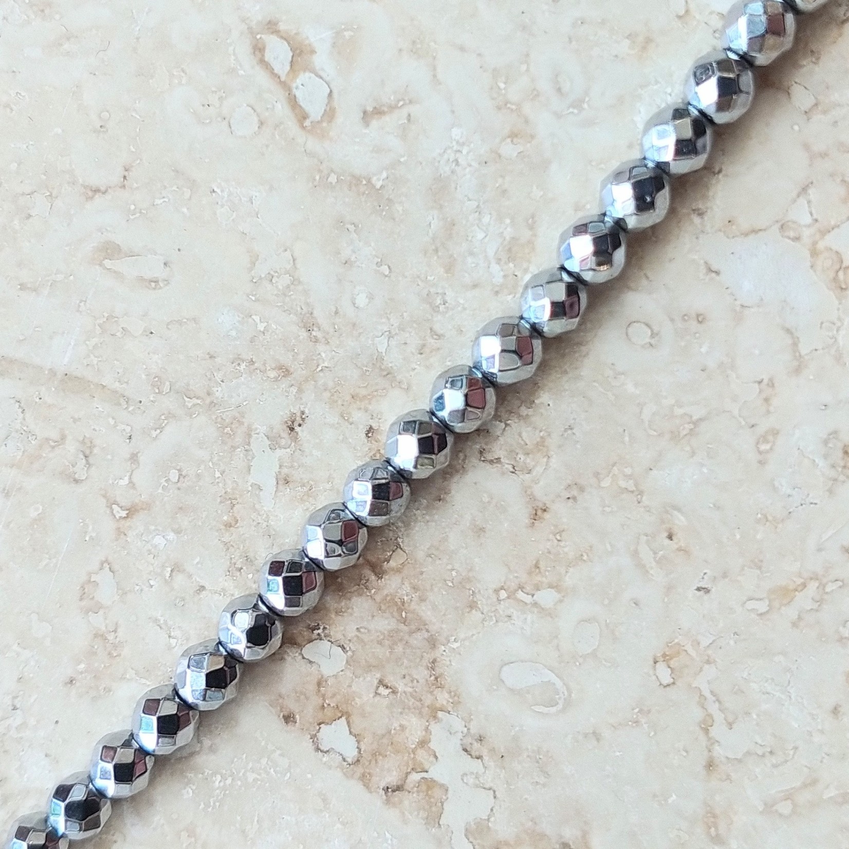 Hematite  3mm Faceted Silver Bead Strand