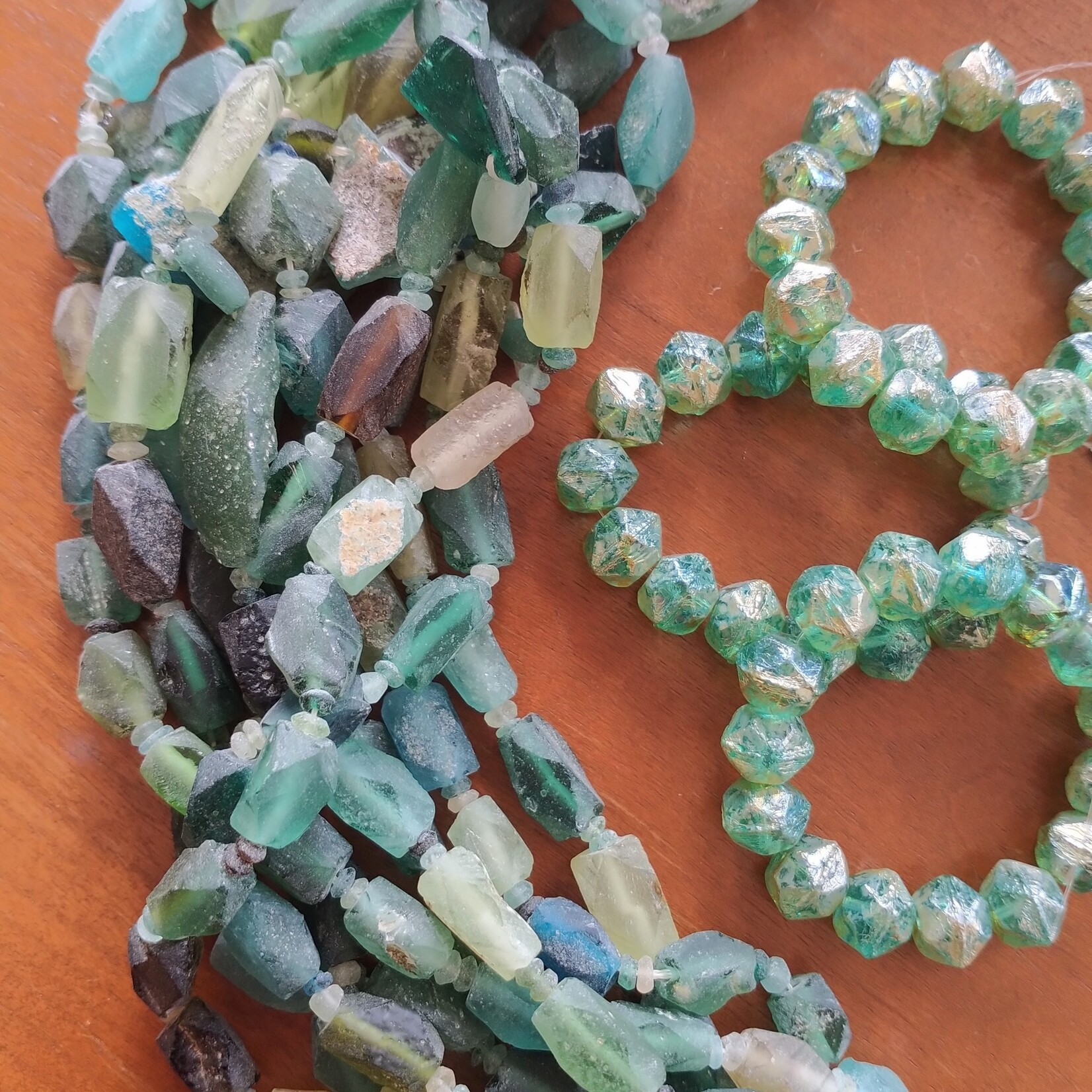Roman Glass Faceted Barrel with Pendant Bead Strand