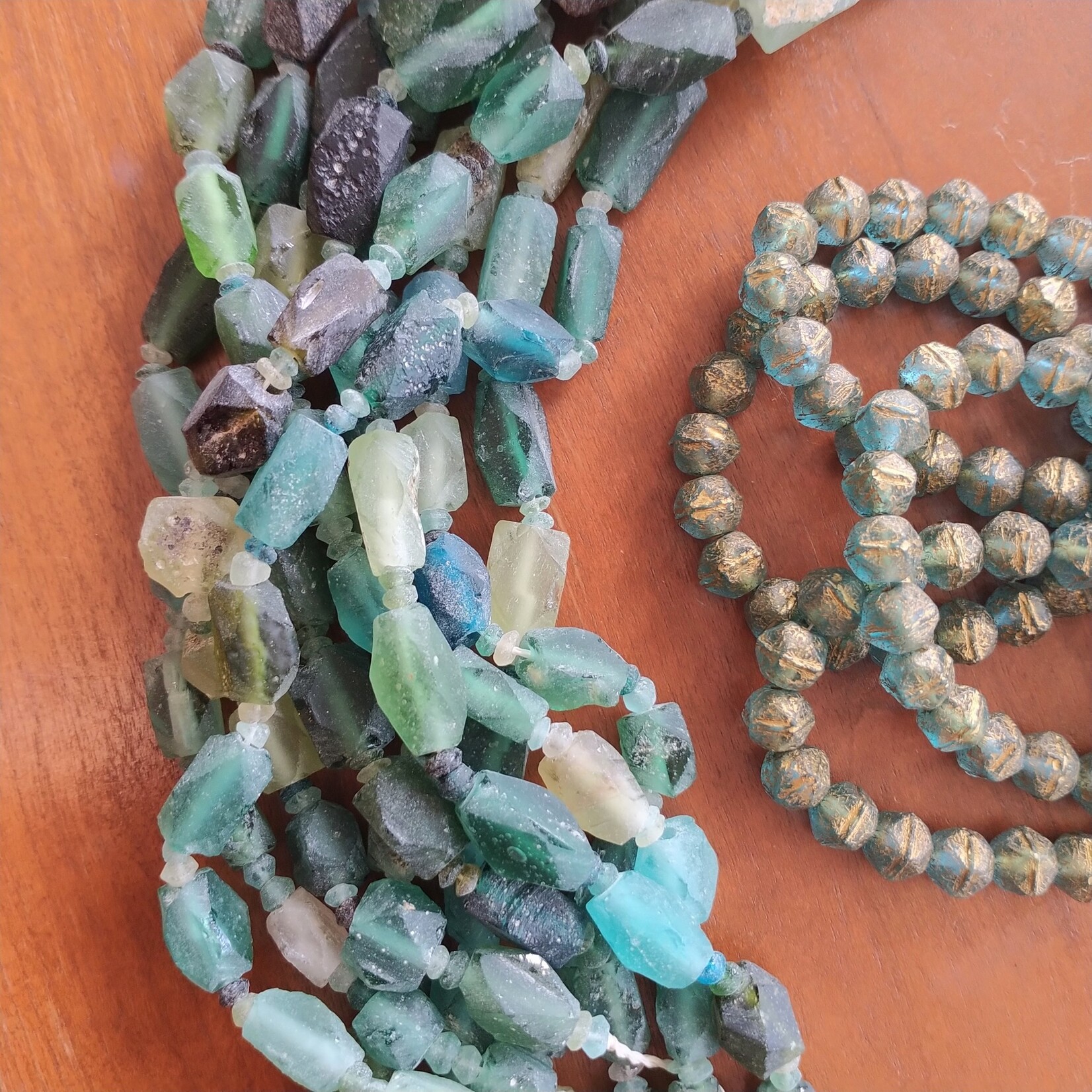 Roman Glass Faceted Barrel with Pendant Bead Strand