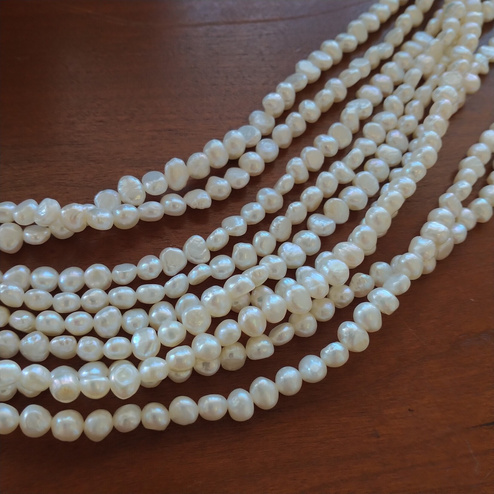 Freshwater Pearls  4-5mm White Bead Strand