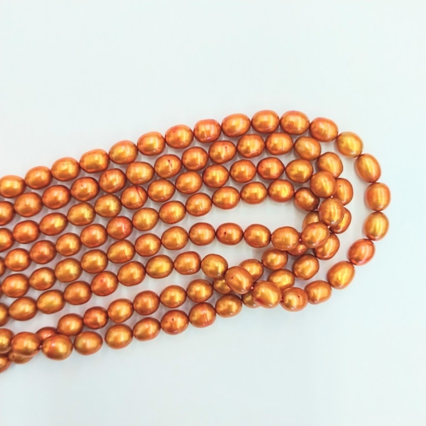 Freshwater Pearls  7.5-8mm Rice Orange Gold Bead Strand