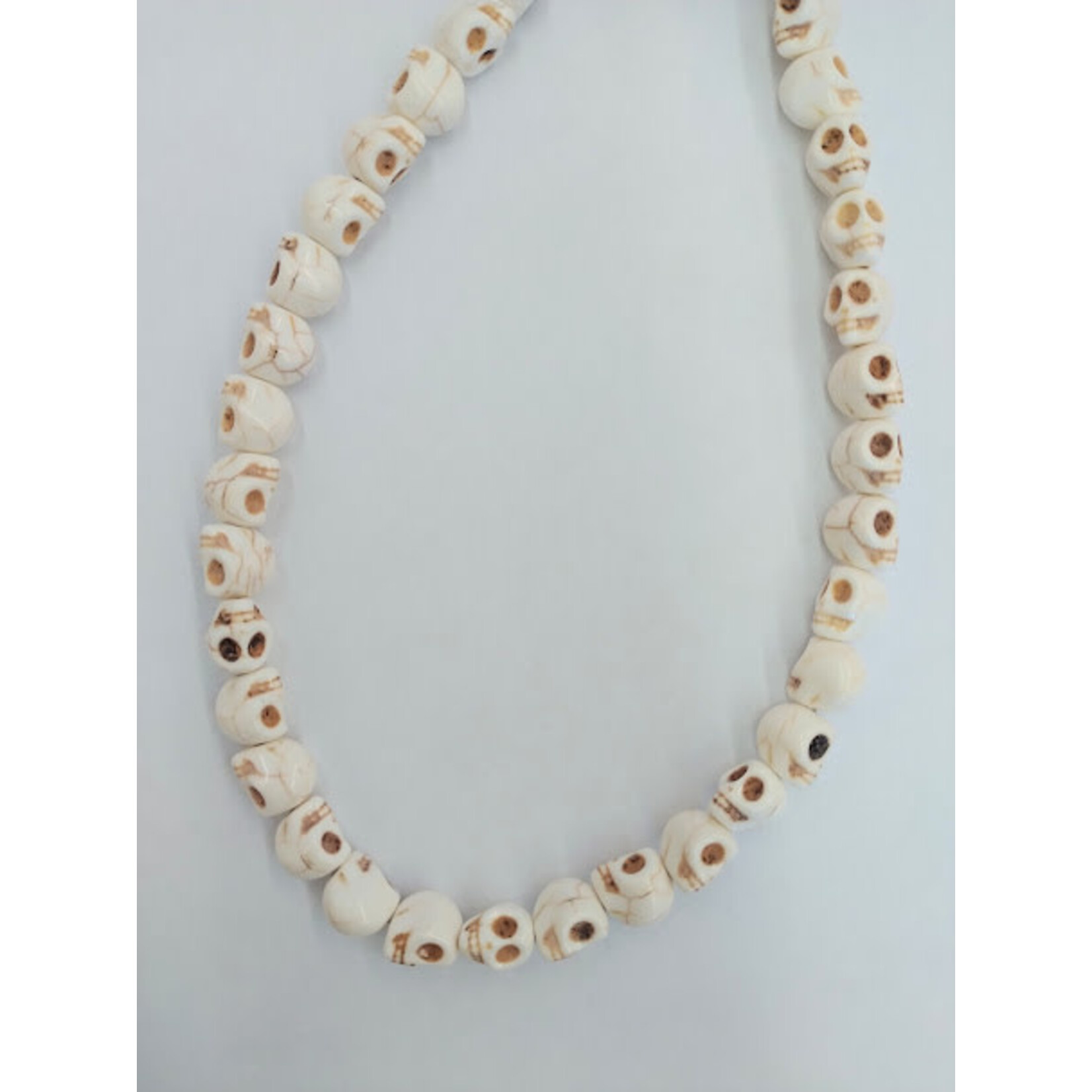 Magnesite White Skull Bead Strand