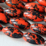 Synthetic  7x14mm Black & Orange Rice Bead Strand