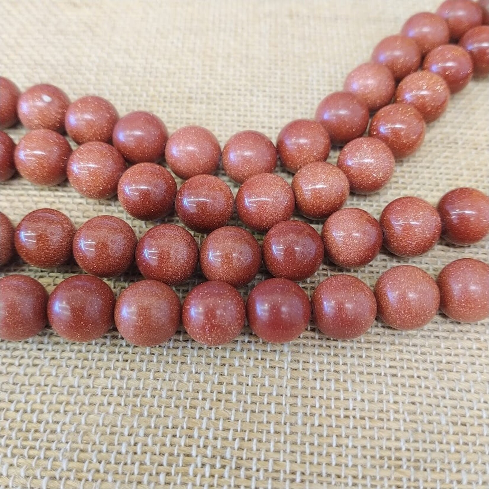 Goldstone 10mm Round Bead Strand