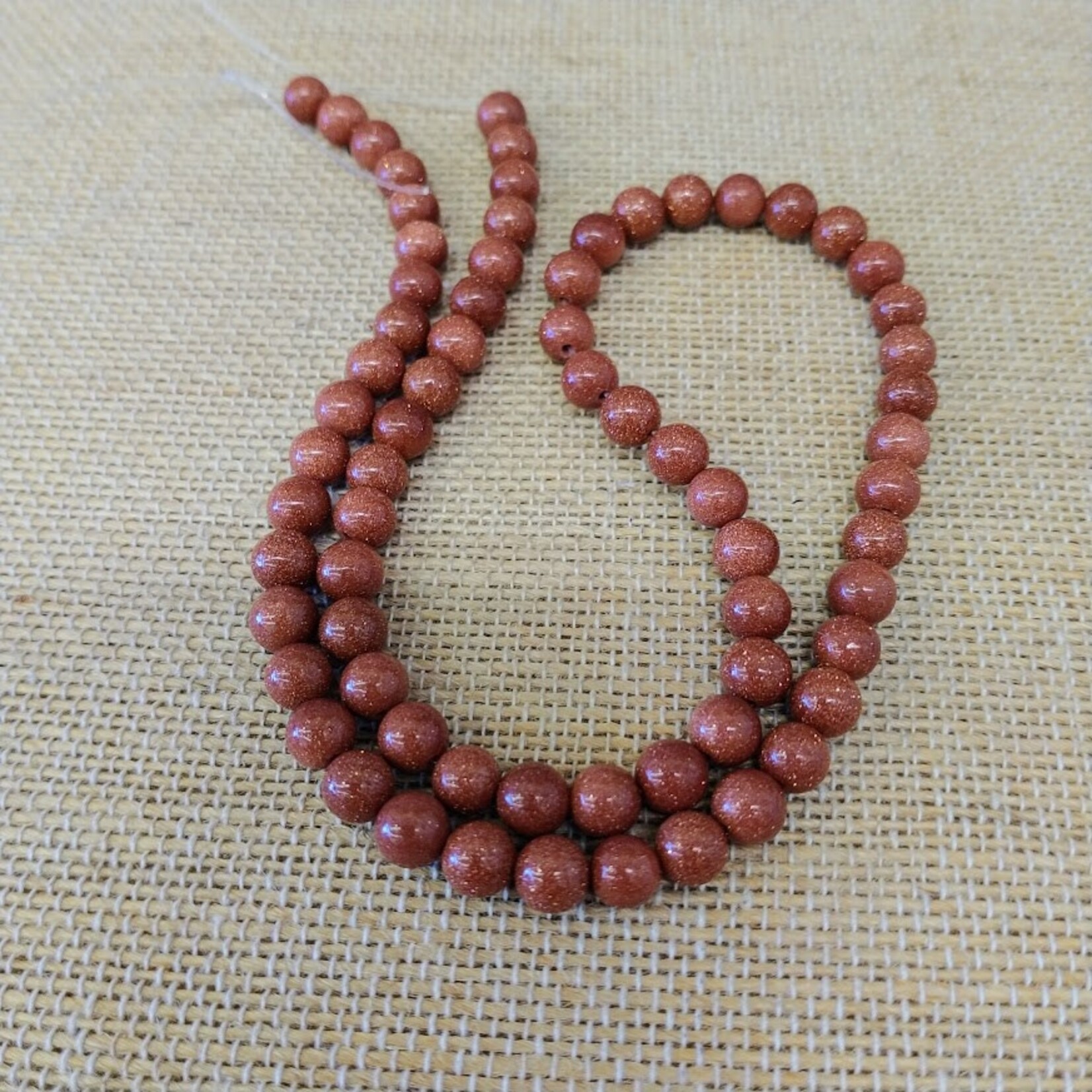 Goldstone  6mm Round Bead Strand