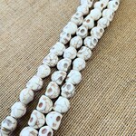Magnesite White Weathered Skull Bead Strand