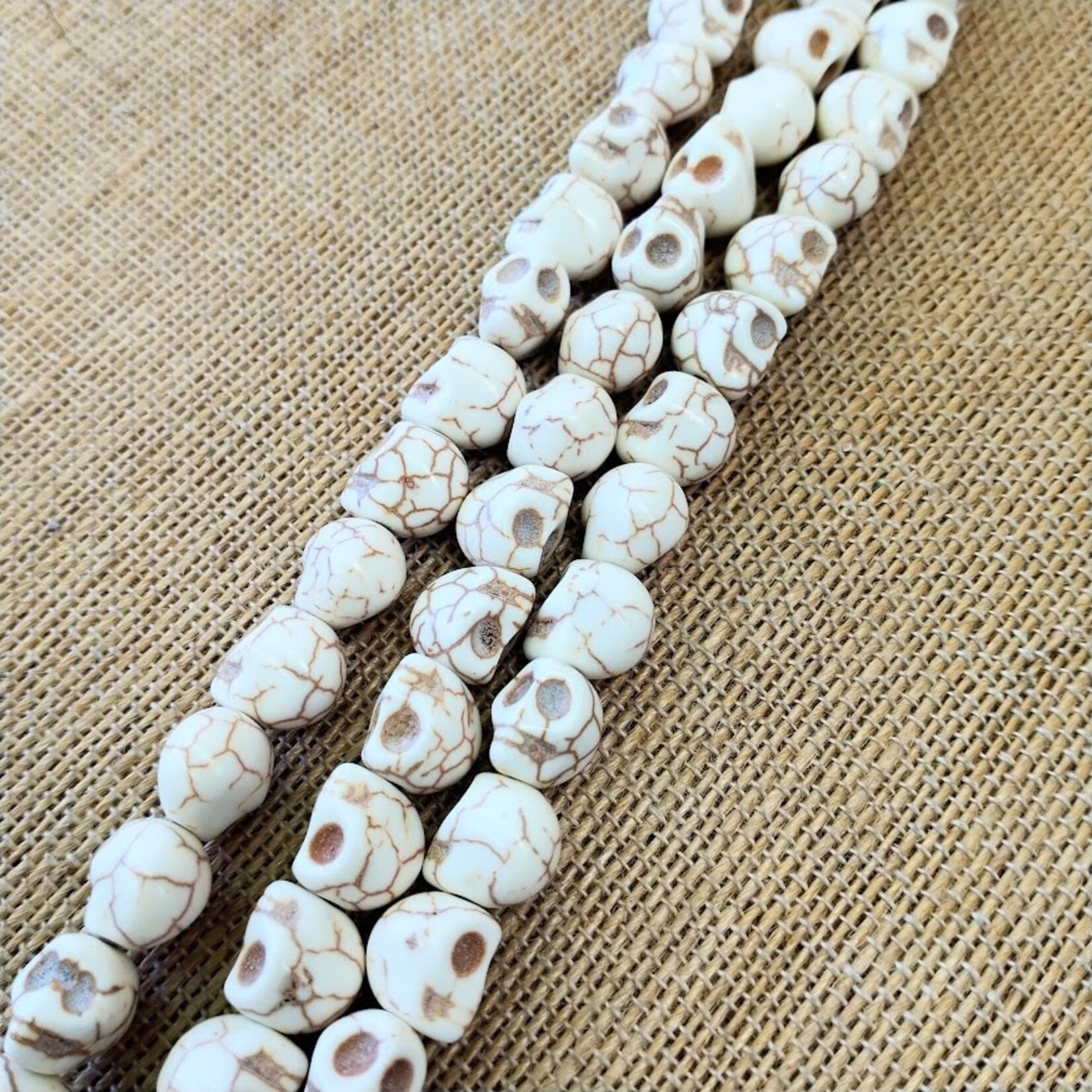 Magnesite White Weathered Skull Bead Strand