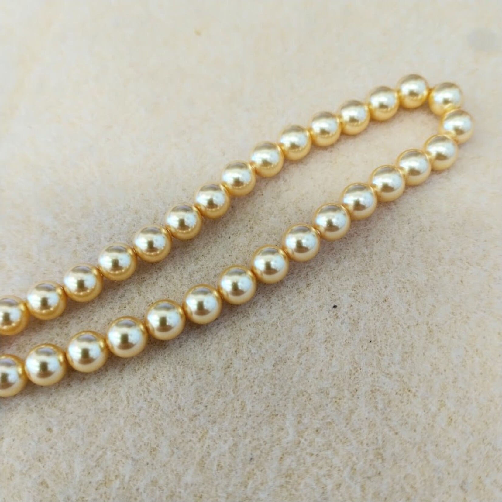 Swarovski Pearl  6mm Round Gold Strand