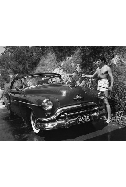 Sid Avery - Rock Hudson washing his 1952 Oldsmobile outside of his North Hollywood home 1952