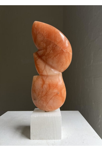 Carol Crawford - Rina, 2022 - Orange alabaster on Italian alabaster base with brass turning pin - 33x12x8cm