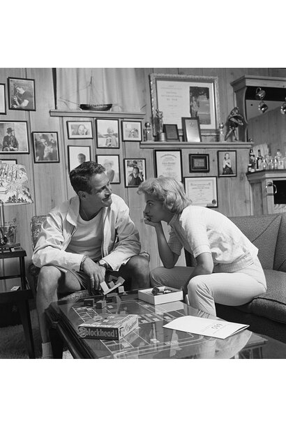 Sid Avery - Paul Newman and Joanne Woodward playing 'blockhead' at their home in Beverly Hills, CA 1958