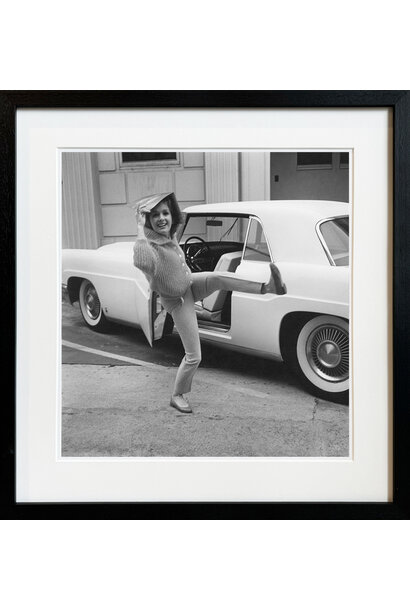 Sid Avery - Debbie Reynolds before going into Paramount to film "The Pleasure of His Company" with her Lincoln Mark 2 1960 - Black and white photograph - 11x14" - Black timber frame with non-reflective glass