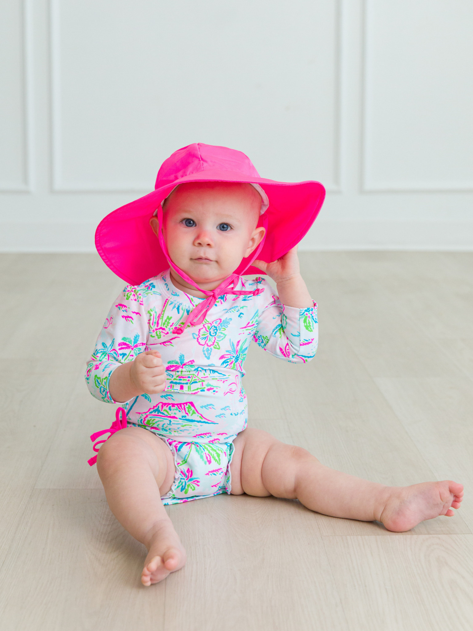 RuffleButts Rufflebutts Tropical Resort Long Sleeve Ruffle One Piece Rash Guard