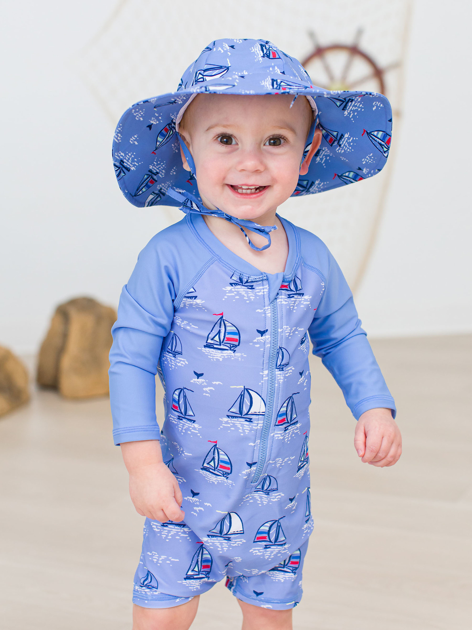 RuffleButts Rufflebutts Seas The Day Long Sleeve One Piece Rushguard