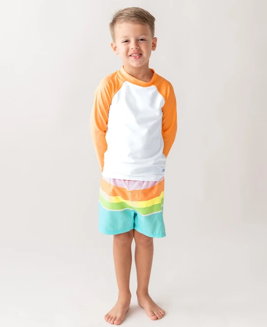 RuffleButts Rufflebutts Island Rainbow Multi-Stripe Swim Trunks