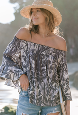 Love Stitch A resort-ready tropical print off the shoulder blouse. Featuring a smocked elastic neckline, ruffled bell sleeves, and a relaxed fit.I-13215W-RFZ-TC
