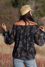 Love Stitch I-13403WL-RHB-ZC Bohemian floral off shoulder top. Featuring long voluminous sleeves, a flounce wrist cuff, a smocked elastic neckline, and a relaxed fit. Lining attached.