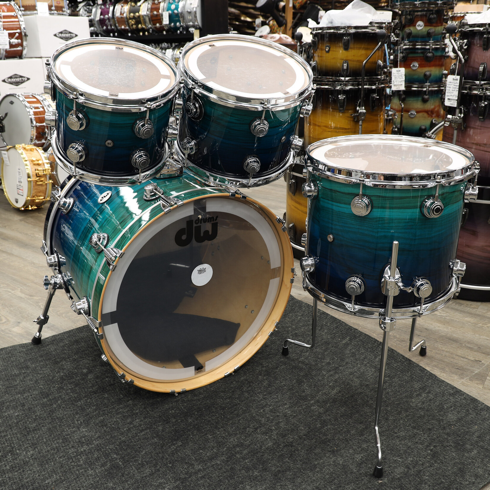 DW Pre-Owned DW Collector's Series Exotic 4-PC Shell Pack 10/12/14/22 (Blue Fade Lacquer on Olive Ash Burl)