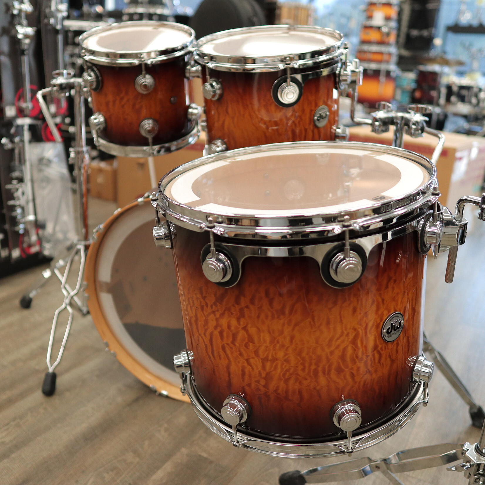 DW Pre-Owned DW Collector's Series Exotic "SSC" 4-Piece Shell Pack 10/12/16/22 (Amber to Rich Tobacco Burst Lacquer over Quilted Maple)