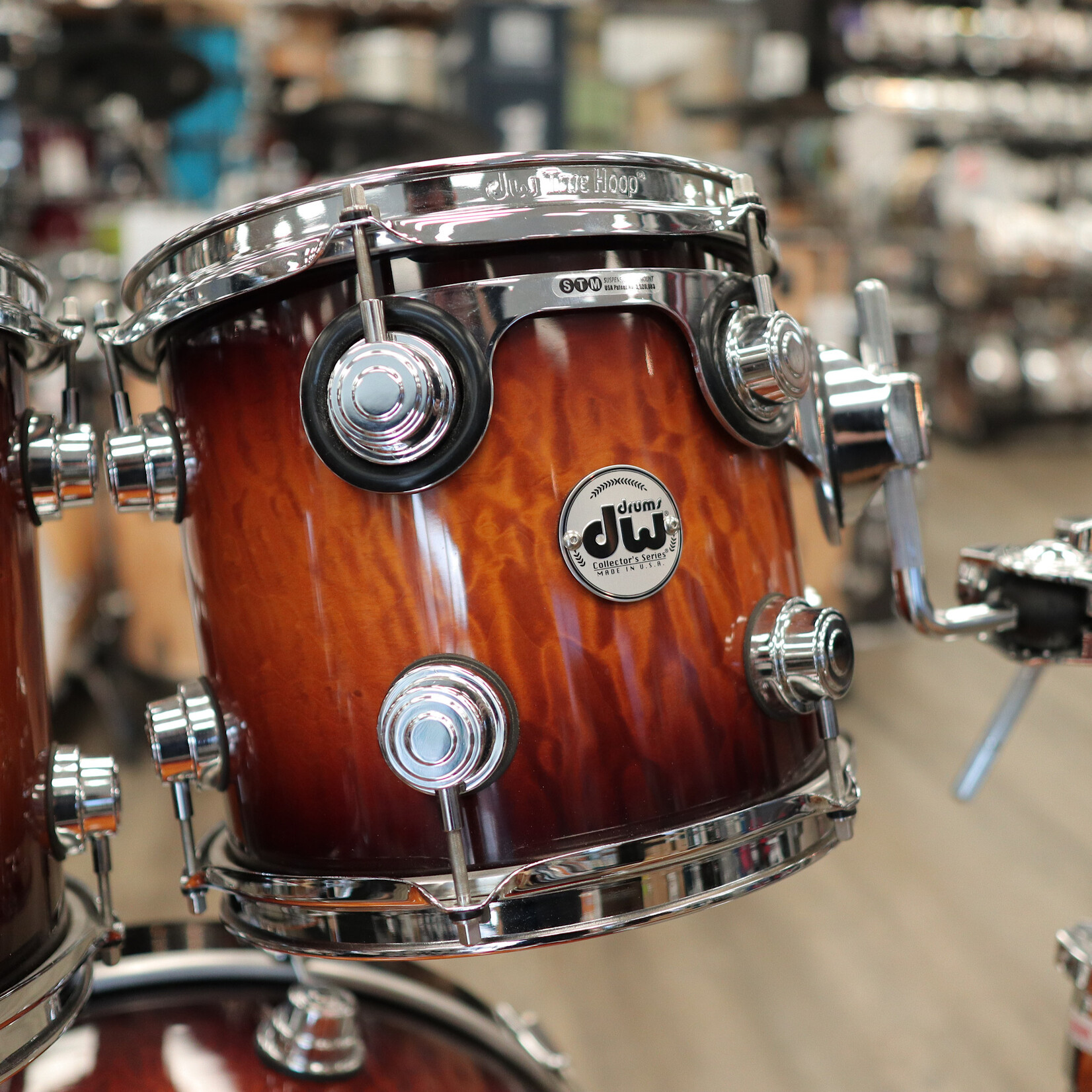 DW Pre-Owned DW Collector's Series Exotic "SSC" 4-Piece Shell Pack 10/12/16/22 (Amber to Rich Tobacco Burst Lacquer over Quilted Maple)