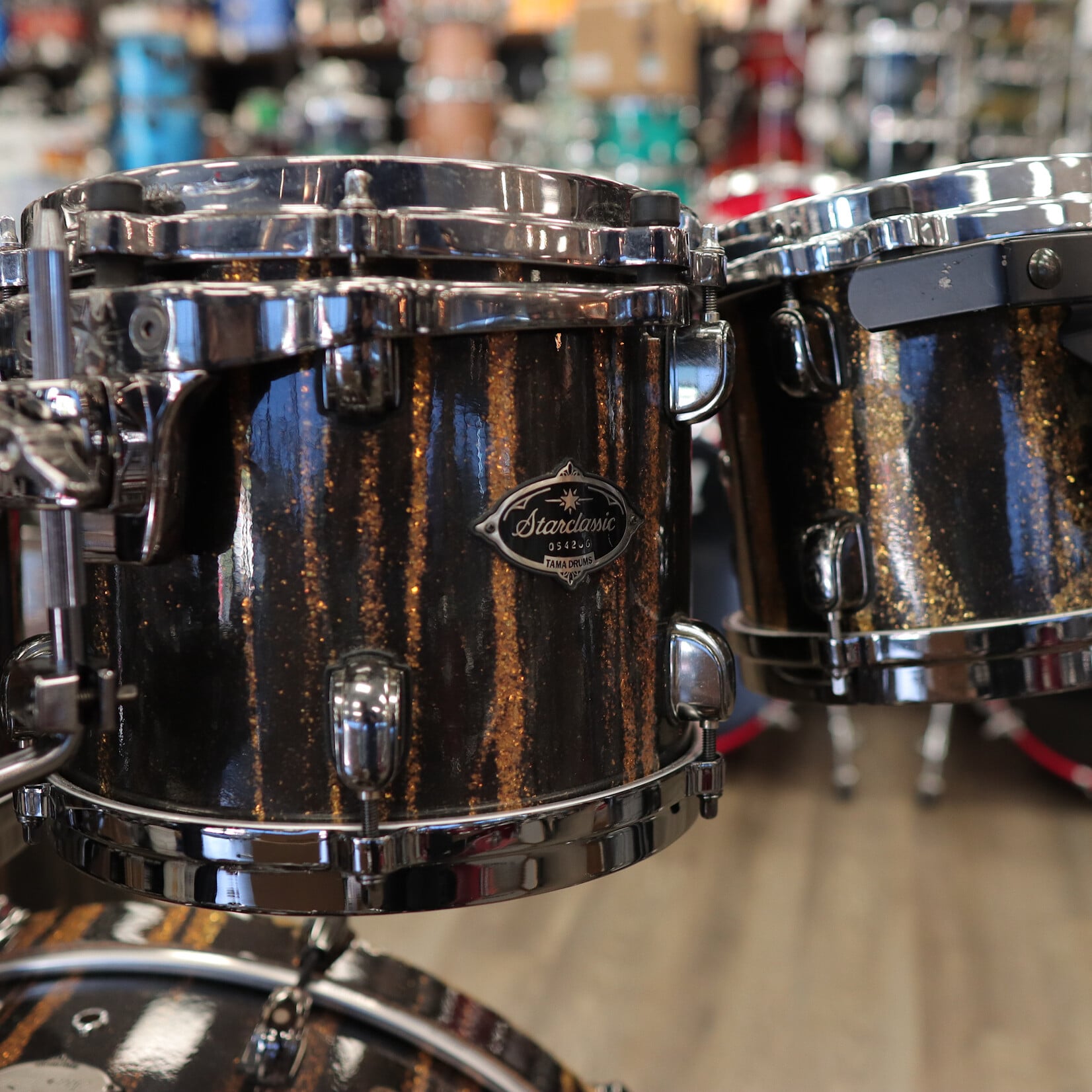 Tama Pre-Owned Tama Starclassic Birch/ Bubinga 5-Piece Shell Pack 8/10/12/16/22 (Yellowed "Black Clouds Silver Linings" Wrap)