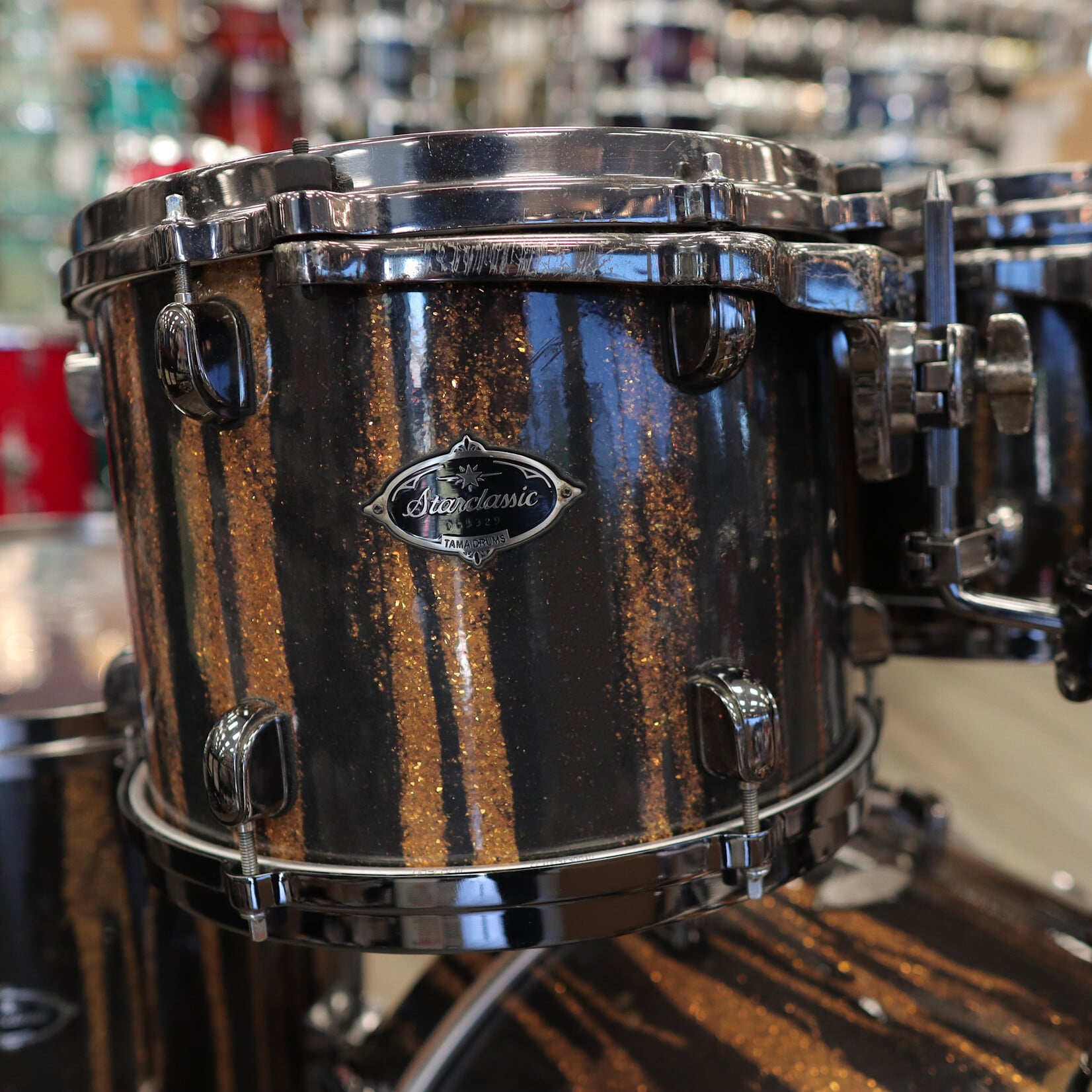 Tama Pre-Owned Tama Starclassic Birch/ Bubinga 5-Piece Shell Pack 8/10/12/16/22 (Yellowed "Black Clouds Silver Linings" Wrap)