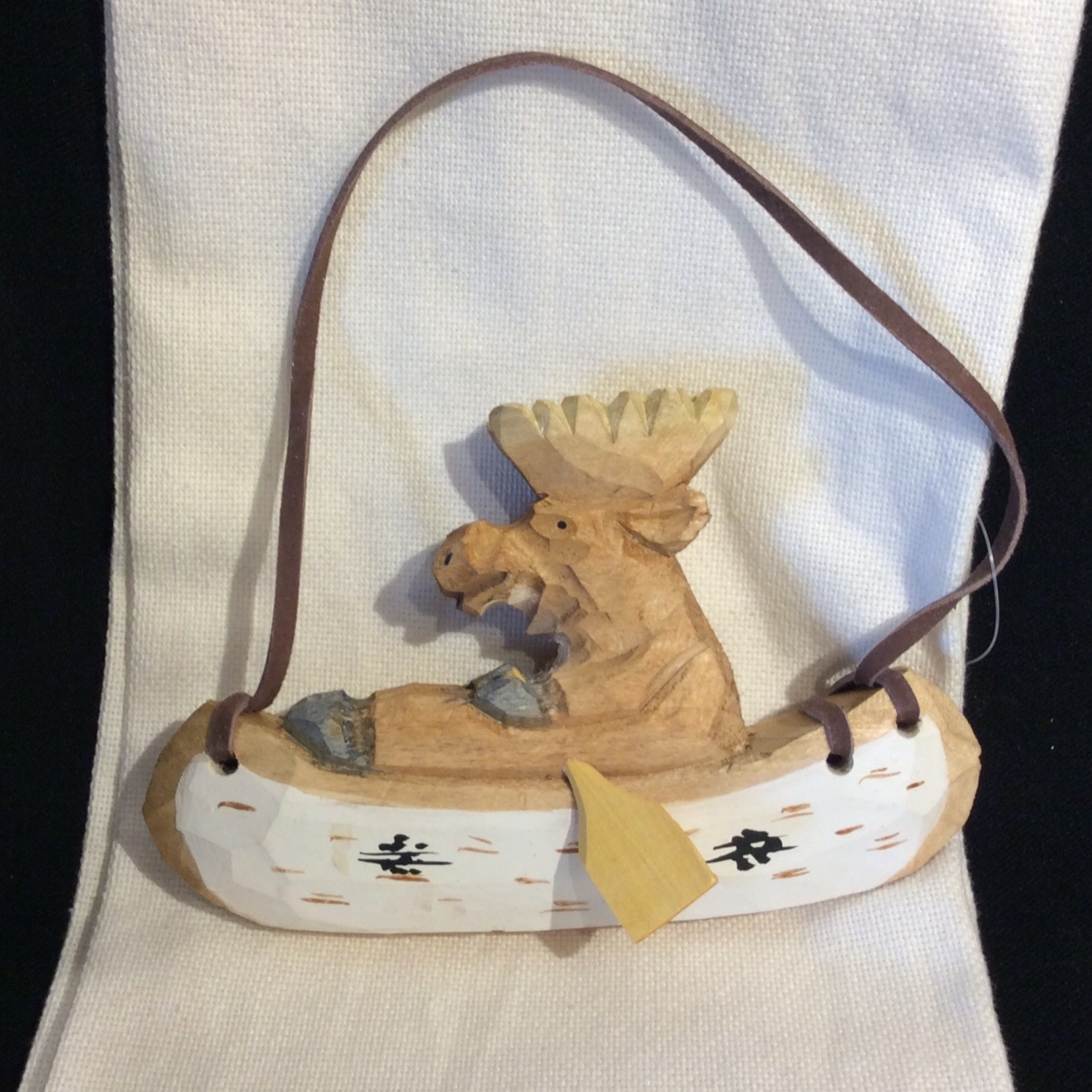 Carved Moose in Canoe Ornament