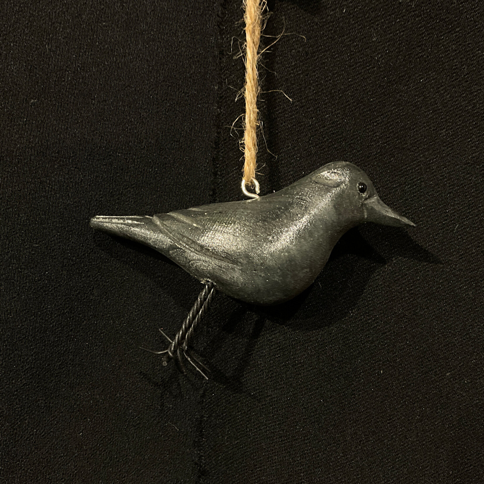 **Carved Crow Ornament
