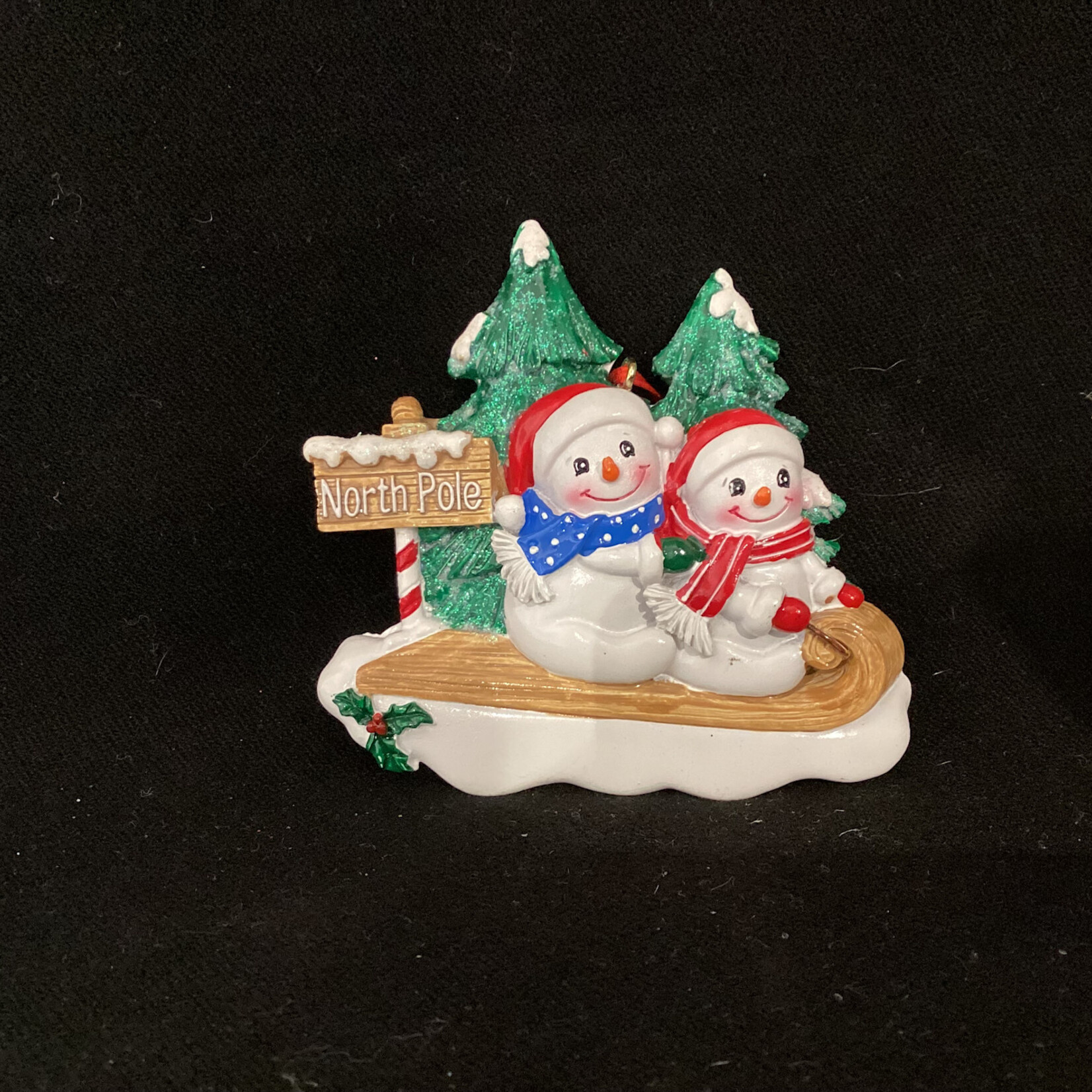* Snowman Couple on Toboggan