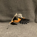 Carved Oriole in Flight