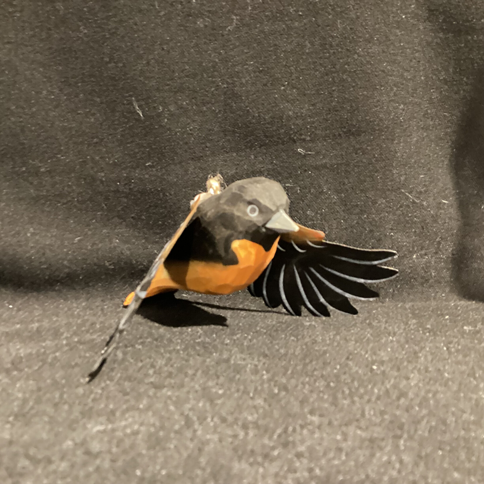 Carved Oriole in Flight