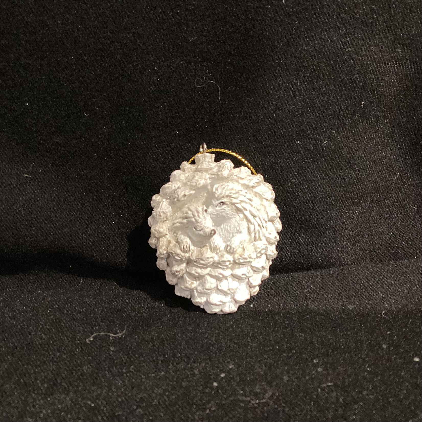 White Hedgehogs in Pinecone Orn