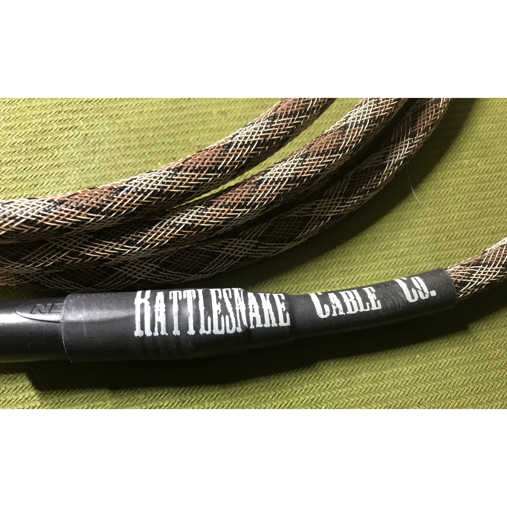 Rattlesnake Cable Co USED Rattlesnake Cable Co Guitar/Instrument Cable "Snake Weave (color)" Approximately 10 foot long ($15 cost if bought at our GGG Physical Store Location)