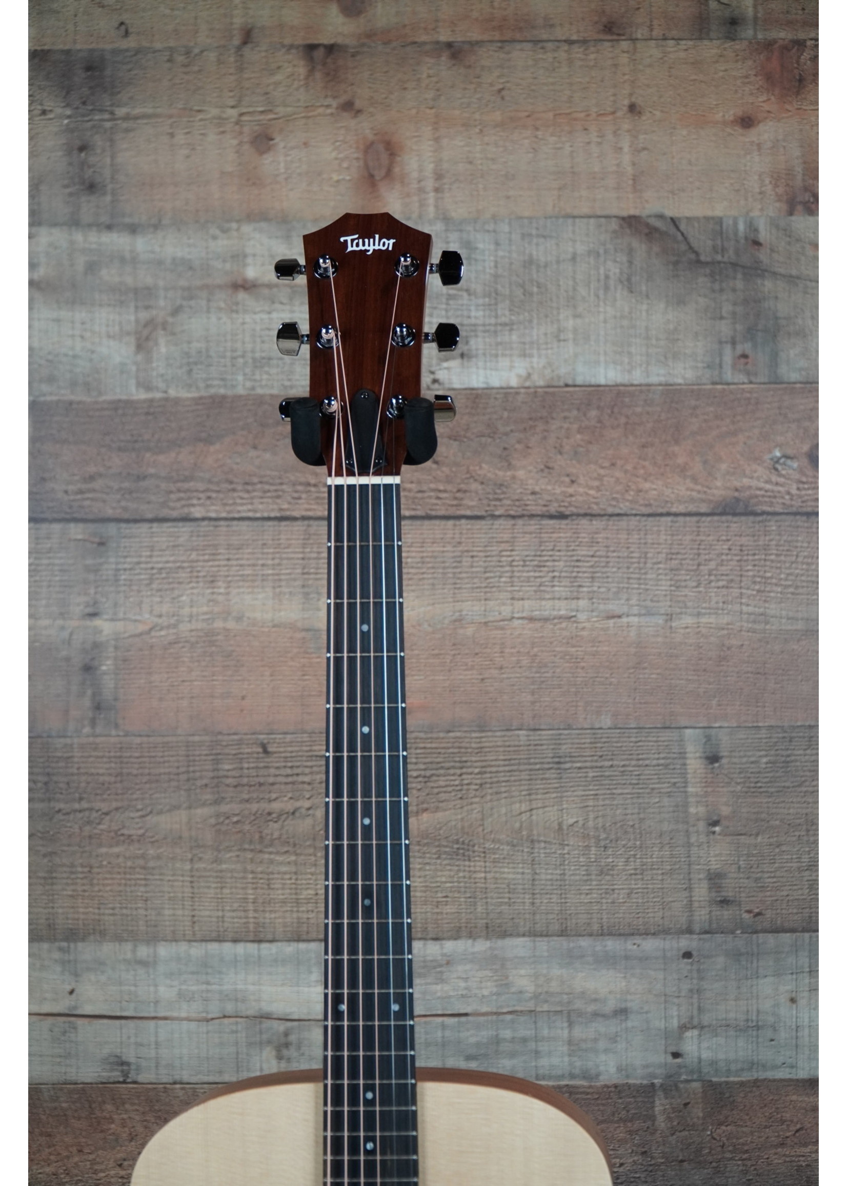 Taylor 6-String | Sitka Spruce Top | Layered Sapele Back and Sides | Maple Neck | West African Crelicam Ebony Fretboard | No Electronics | Non-cutaway | Gig Bag Case