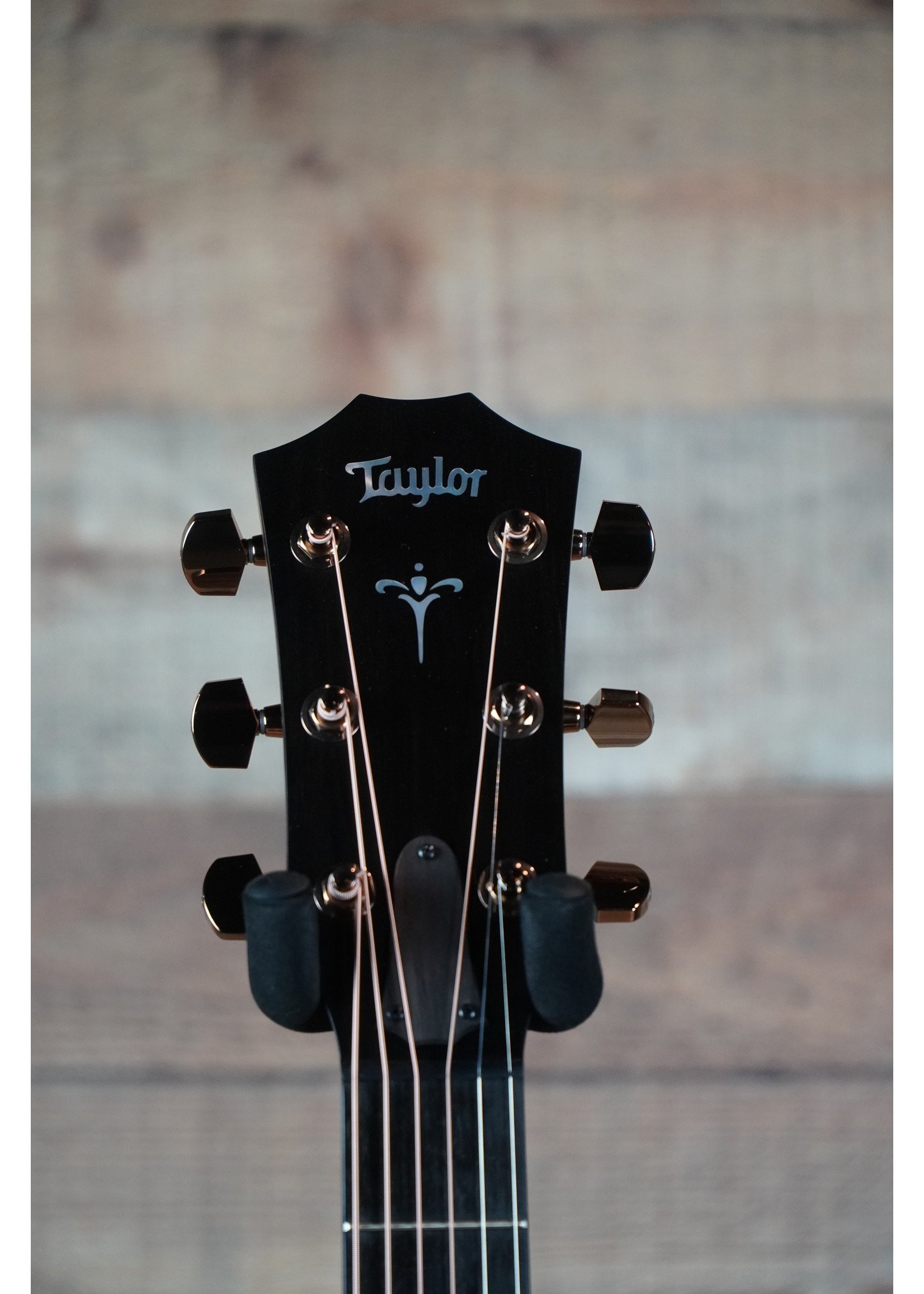 Taylor 724CE Hawaiian Koa Top | Hawaiian Koa Back and Sides | Tropical Mahogany Neck | West African Crelicam Ebony Fretboard | Expression System® 2 Electronics | Venetian Cutaway | Taylor Deluxe Hardshell Brown Case