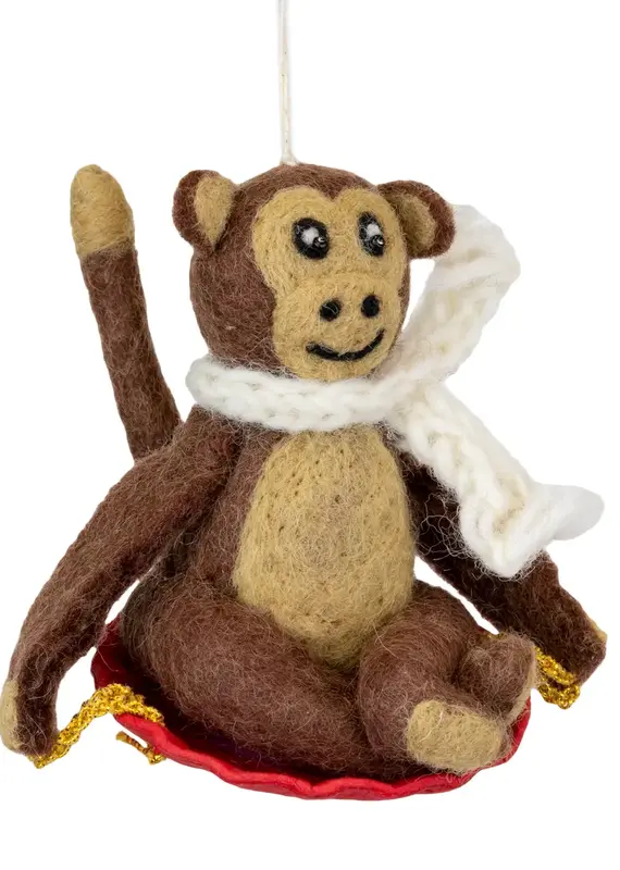 dZi Sledding Monkey Ornament
