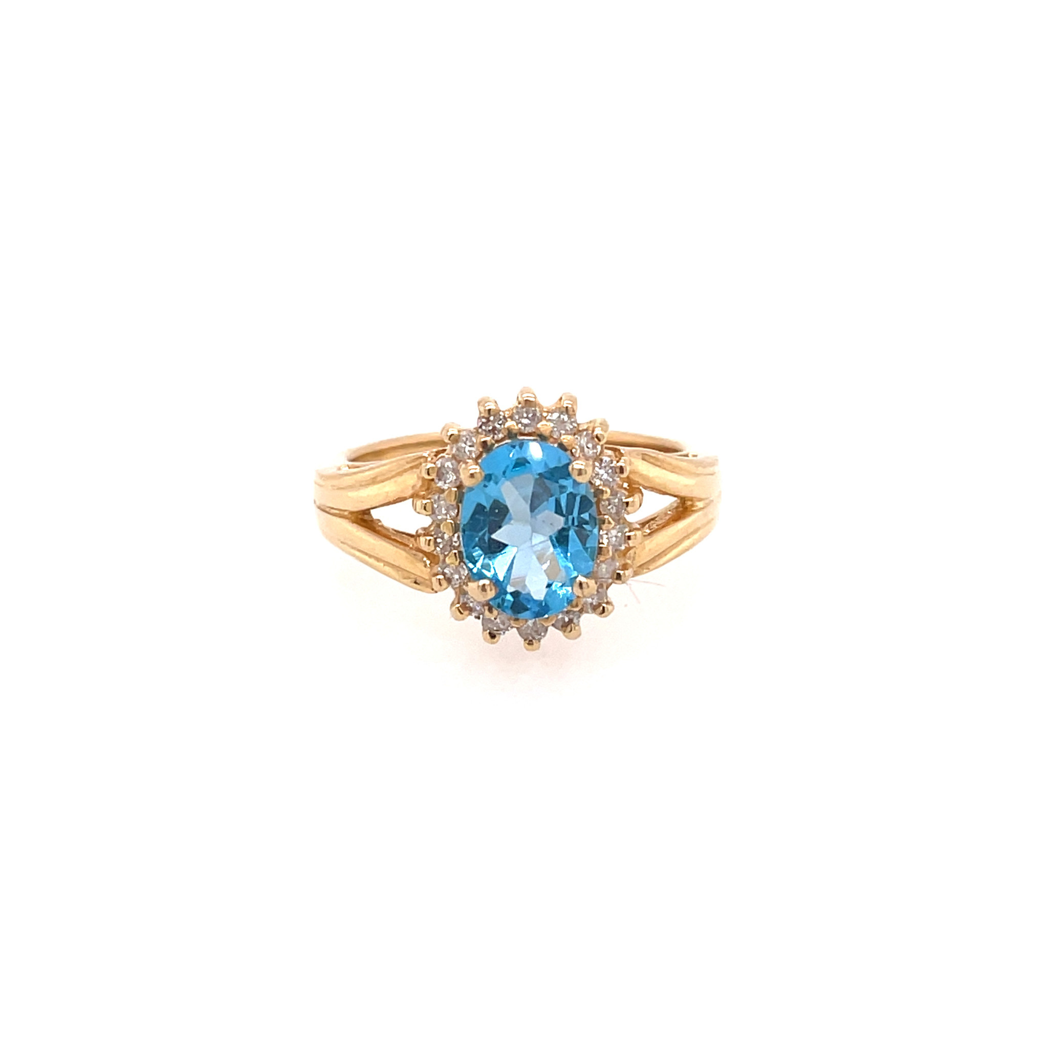 45169 14K YELLOW GOLD OVAL BLUE TOPAZ CENTER .25TCW DIAMOND SPLIT SHANK RING
