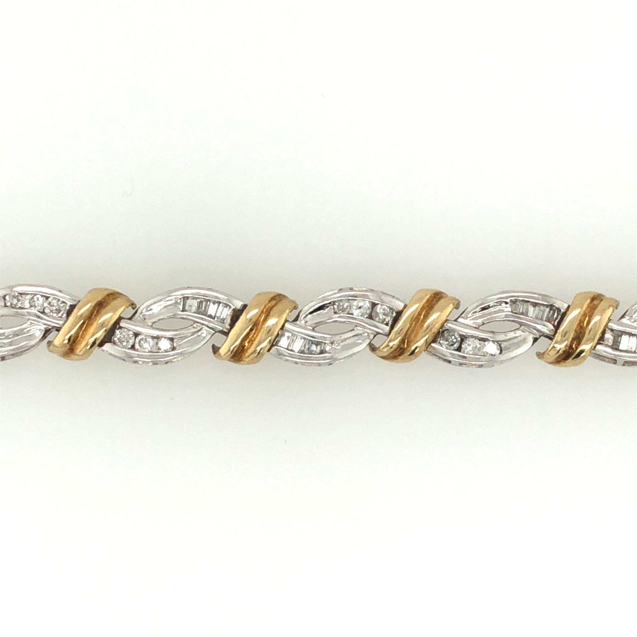 20006 2 TONE WAVY BRAIDED 2.25TCW BAGUETTE AND ROUND DIAMOND BRACELET