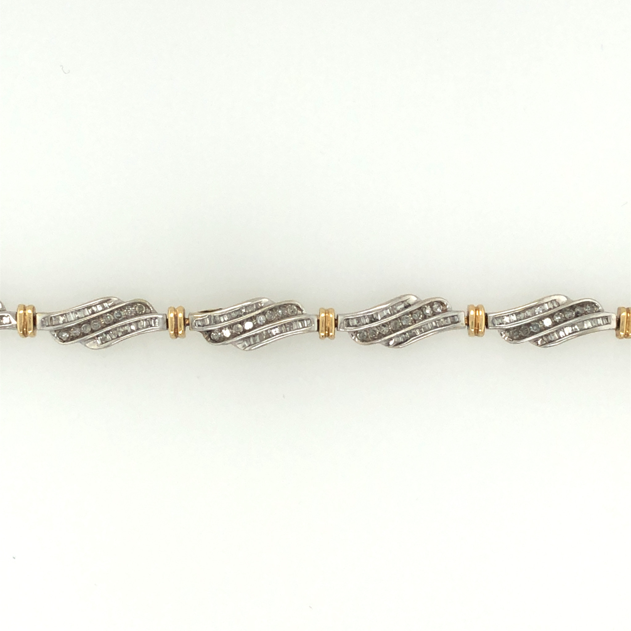 20070 2 TONE WAVY 2.25CT BAGUETTE AND ROUND DIAMOND BRACELET