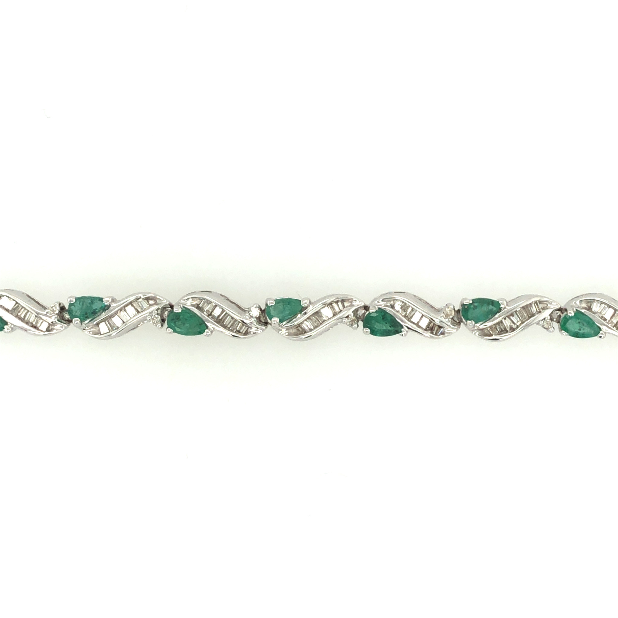 20600 14K YELLOW GOLD 4CT EMERALD AND 1.5CT BAGUETTE CHANNEL SET DIAMOND BRACELET 20600 14K YELLOW GOLD 4CT EMERALD AND 1.5CT BAGUETTE CHANNEL SET DIAMOND BRACELET