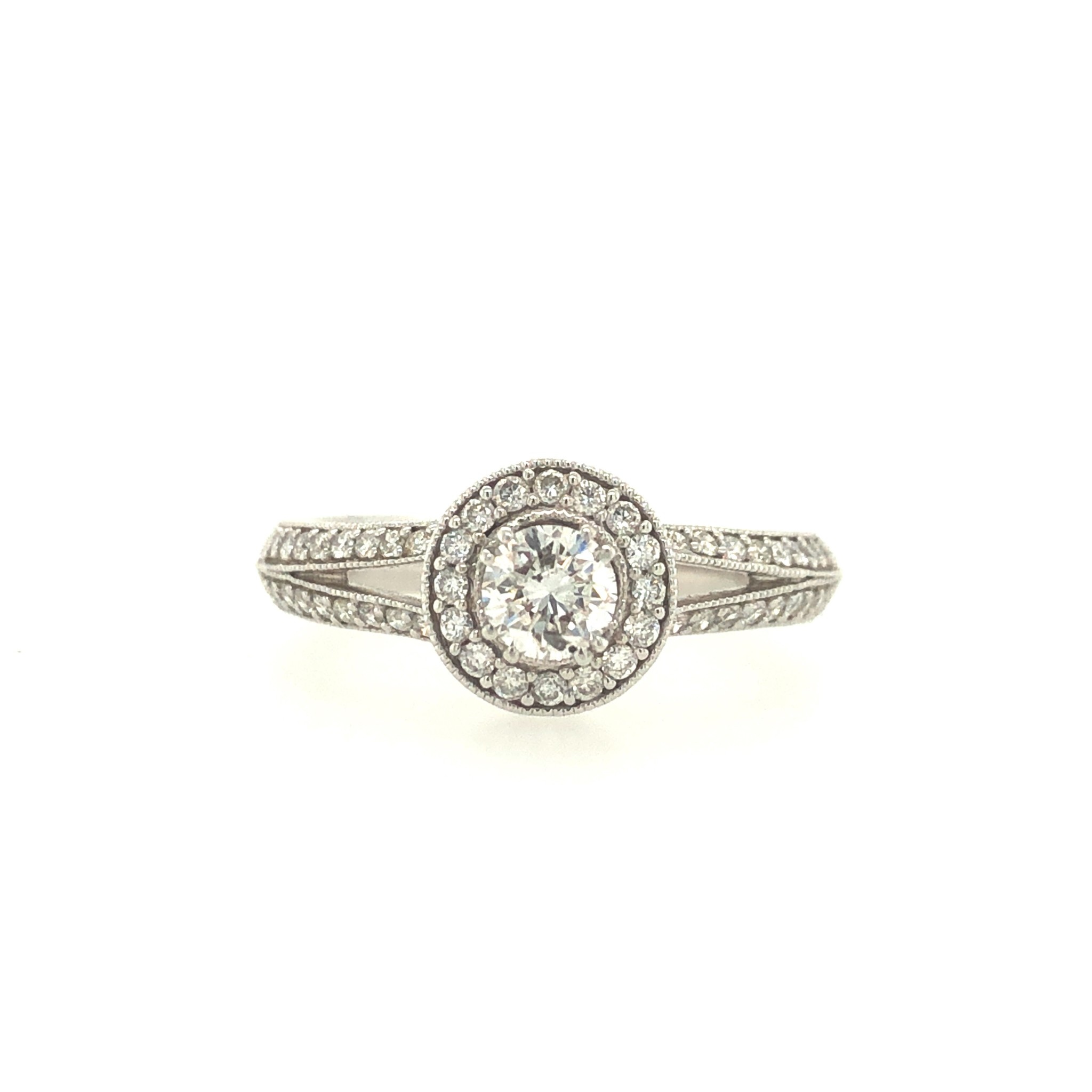 477975 18K WHITE GOLD MILGRAIN ANTIQUE DESIGN .67CT H SI1 ROUND CENTER HALO SPLIT SHANK ENGAGEMENT RING