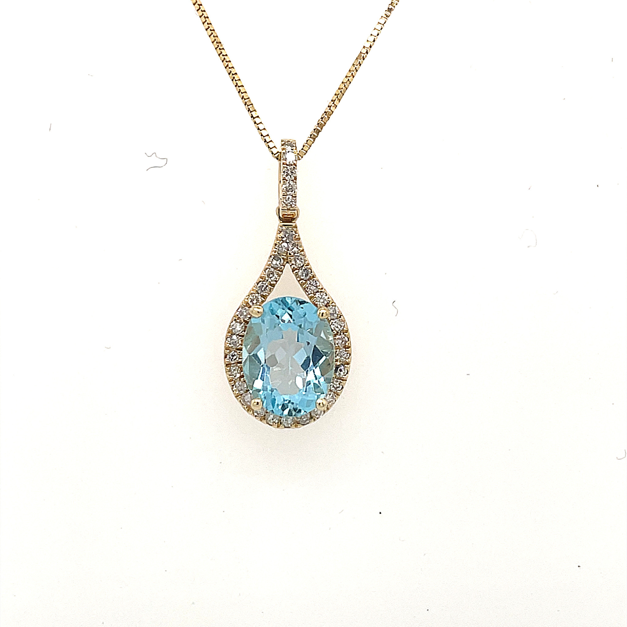 14K YELLOW GOLD .25TCW DIAMOND HALO OVAL BLUE TOPAZ PENDANT SET