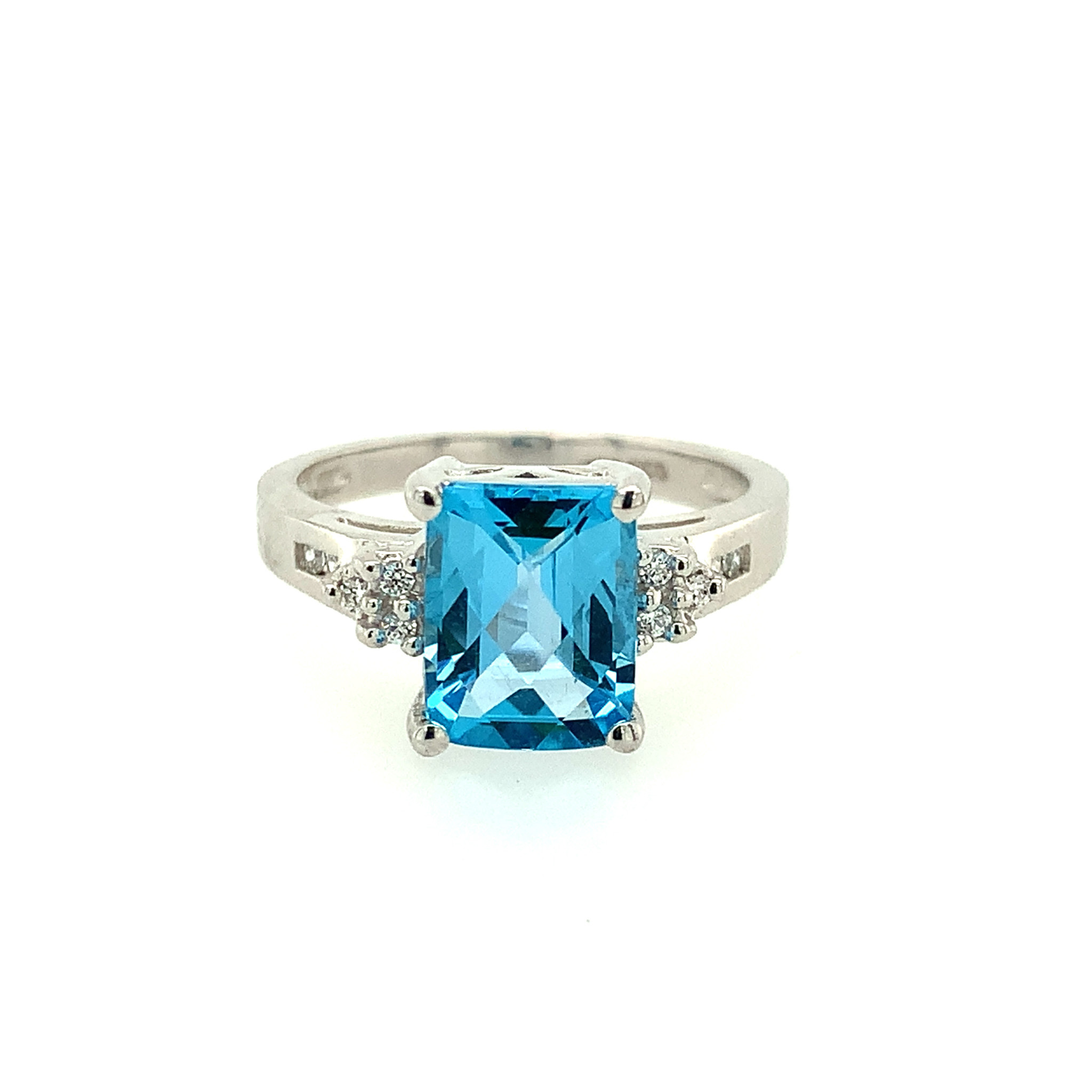 40118 10K WHITE GOLD BLUE TOPAZ CHECKERBOARD CUT .10TCW DIAMOND SIDE STONE RING