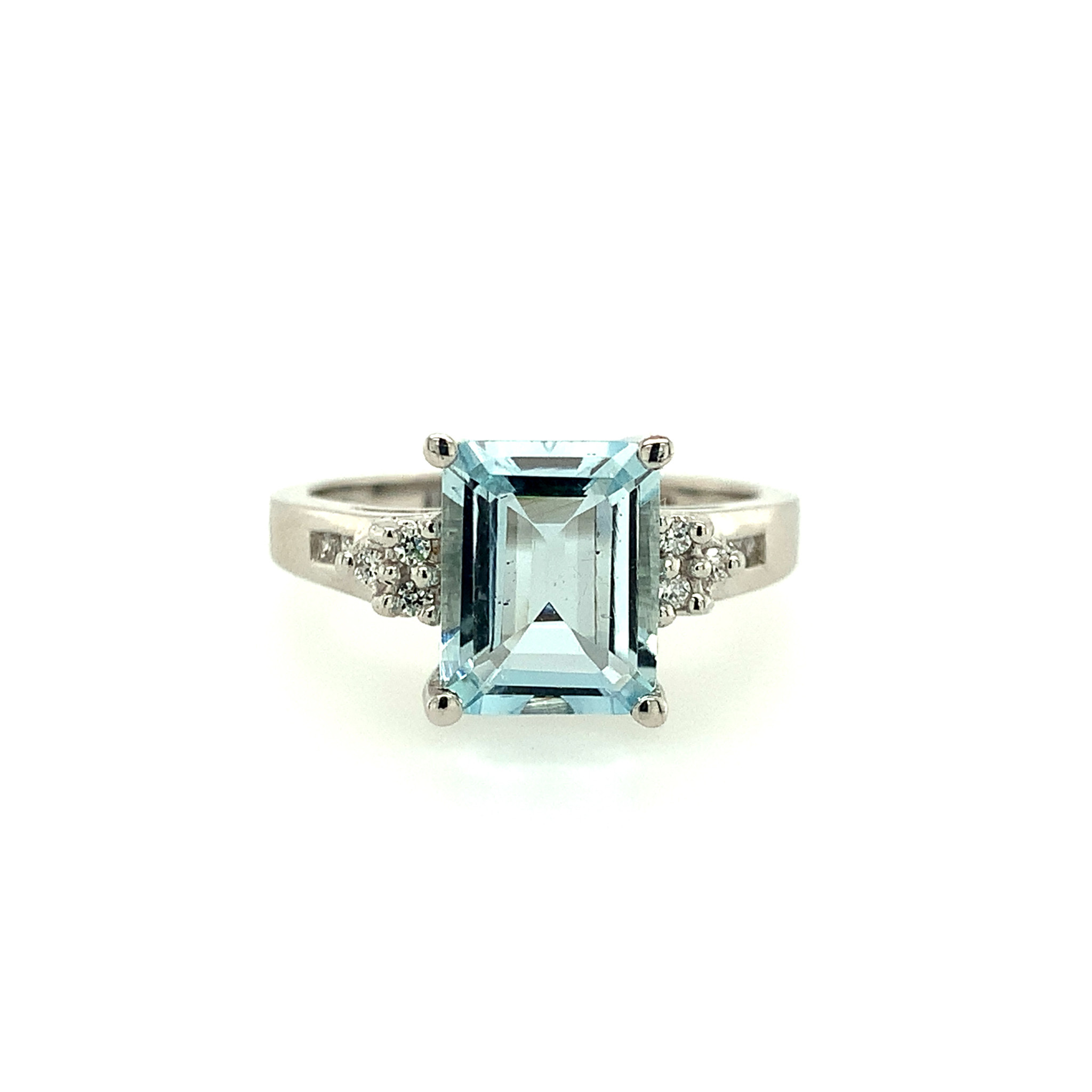 40117 10K WHITE GOLD AQUAMARINE EMERALD CUT CENTER WITH .10TCW DIAMOND SIDE STONES RING