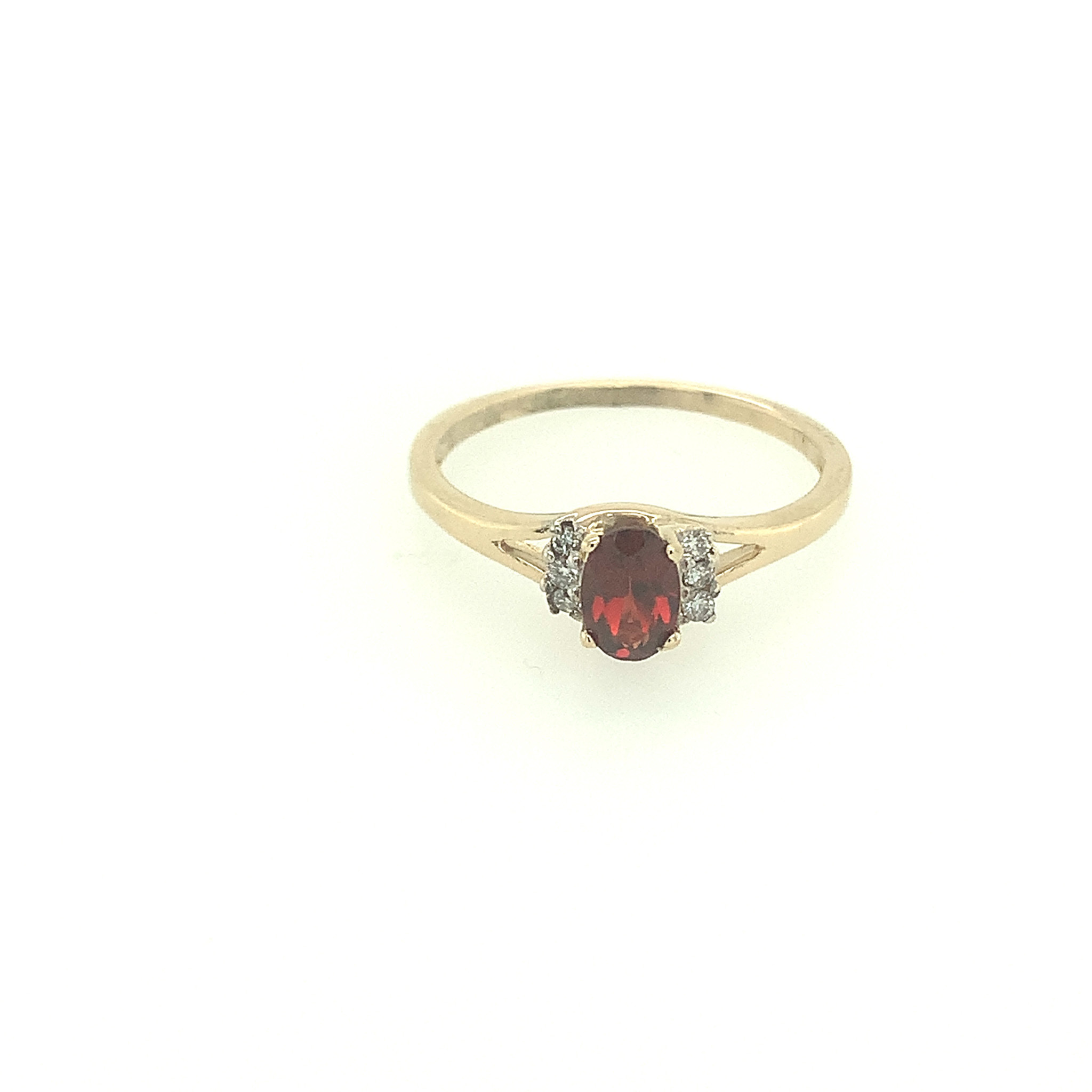 40142 14K YELLOW GOLD OVAL GARNET CENTER WITH .06TCW DIAMOND SIDE STONES BIRTH STONE RING