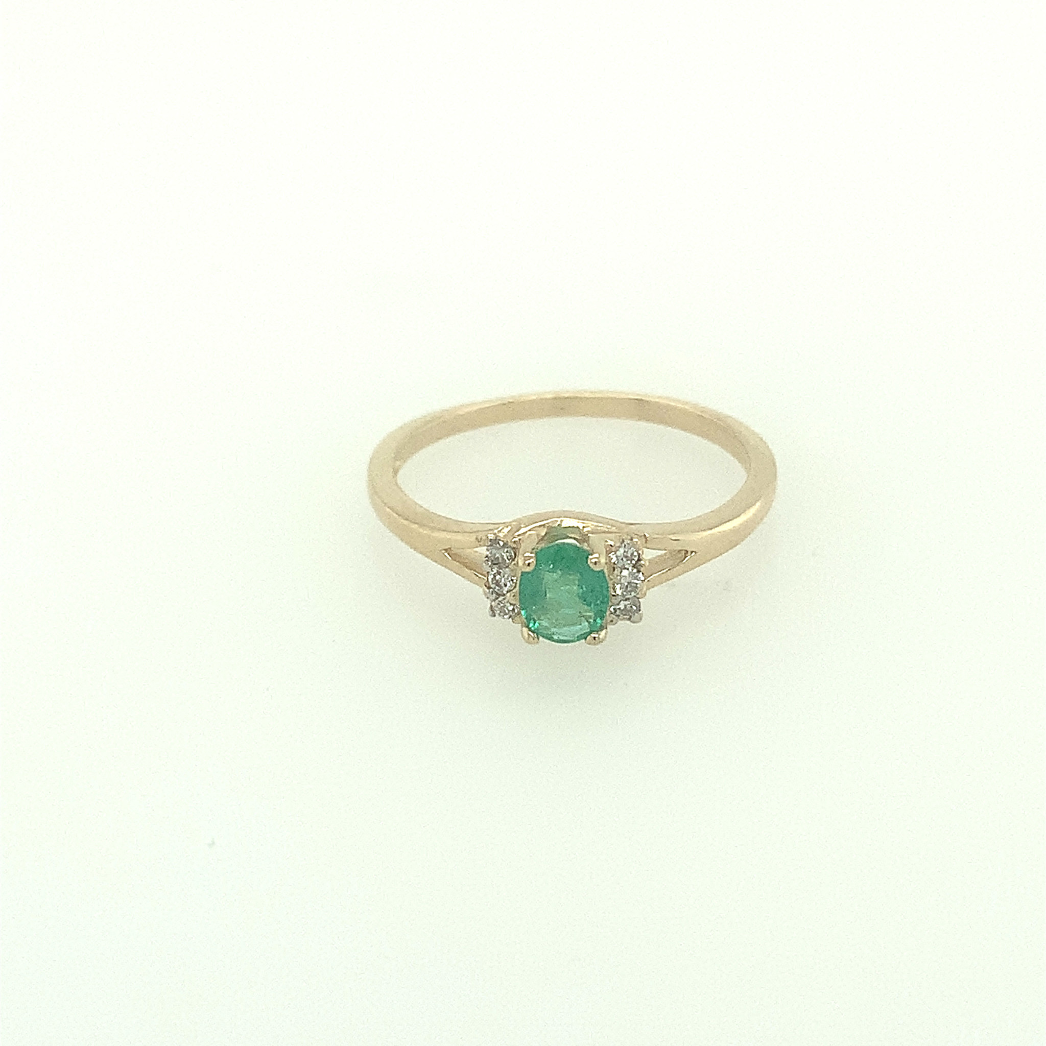40141 14K YELLOW GOLD OVAL EMERALD CENTER WITH .06TCW DIAMOND SIDE STONES BIRTH STONE RING