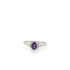 40288 14K WHITE GOLD OVAL AMETHYST CENTER WITH .06TCW DIAMOND SIDE STONES BIRTH STONE RING
