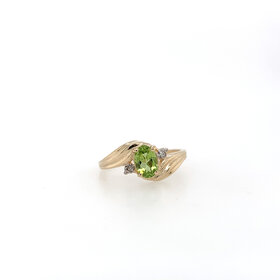 40341 14K YELLOW GOLD OVAL PERIDOT DIAMOND ON THE SIDES WAVED DESIGN RING